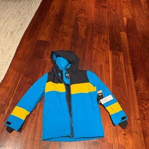 Quiksilver Kids Puffer Jacket in Blue and Yellow. 10k waterproofing